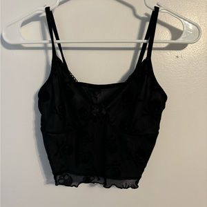 black skull printed sheer layered tank top with little black bow in the middle